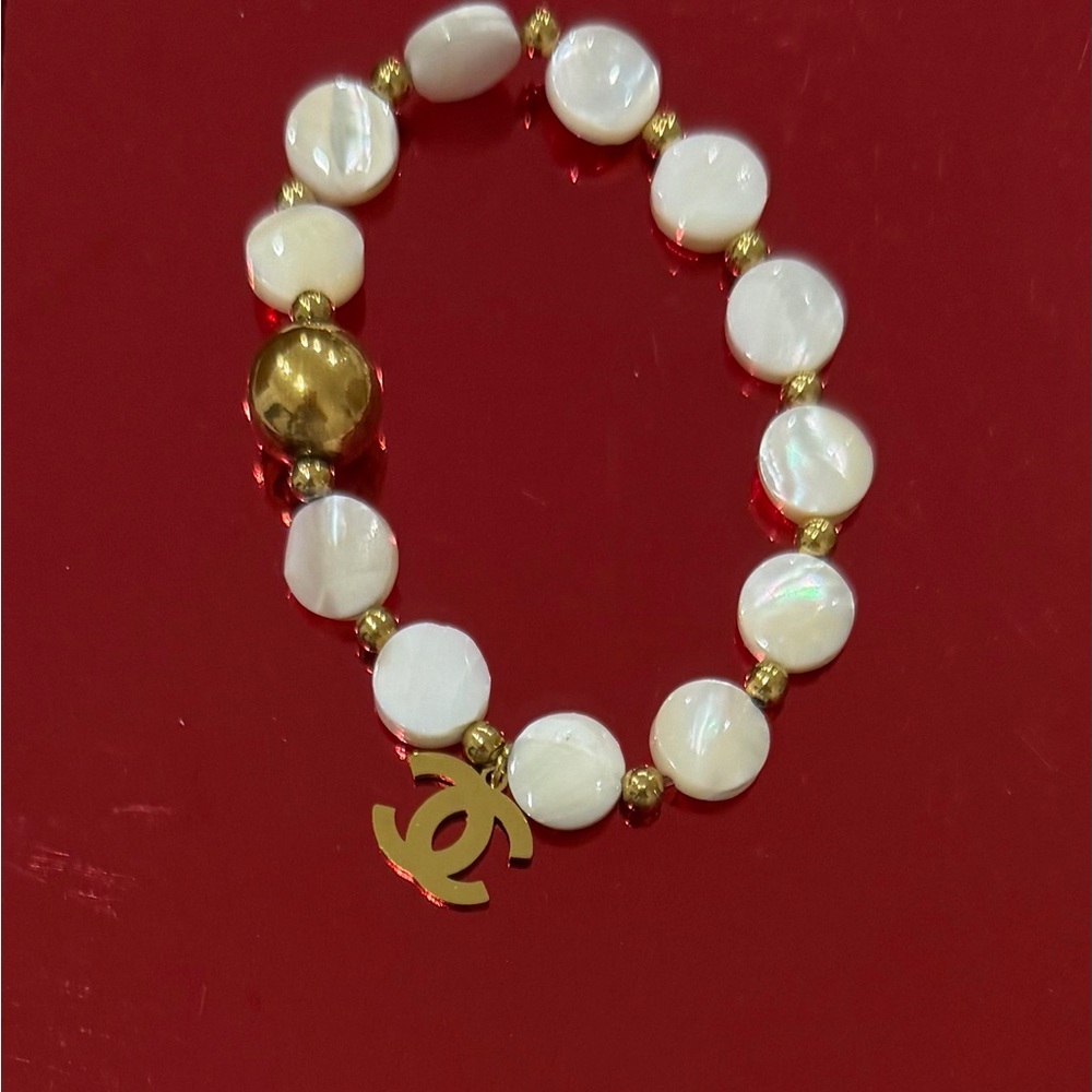 Gold Logo White Shell Bead Stretch Bracelet